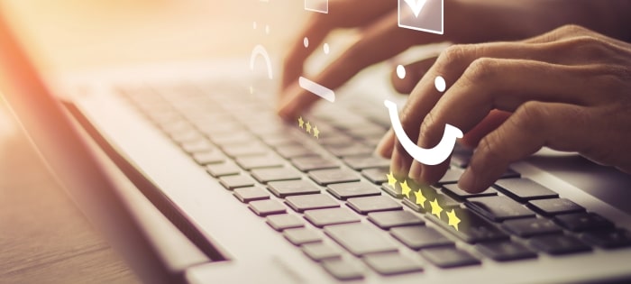 Woman Typing Review On Keyboard Min